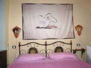 Stanza tripla - letto matrimoniale